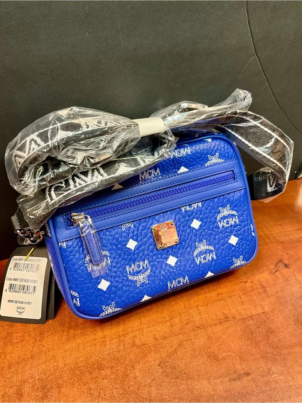 MCM Royal Blue Visetos Logo Messenger Bag, with Polished Metal Logo Plaque